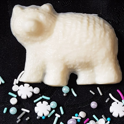 White Polar Bear Chocolate with spinklers on the floor.